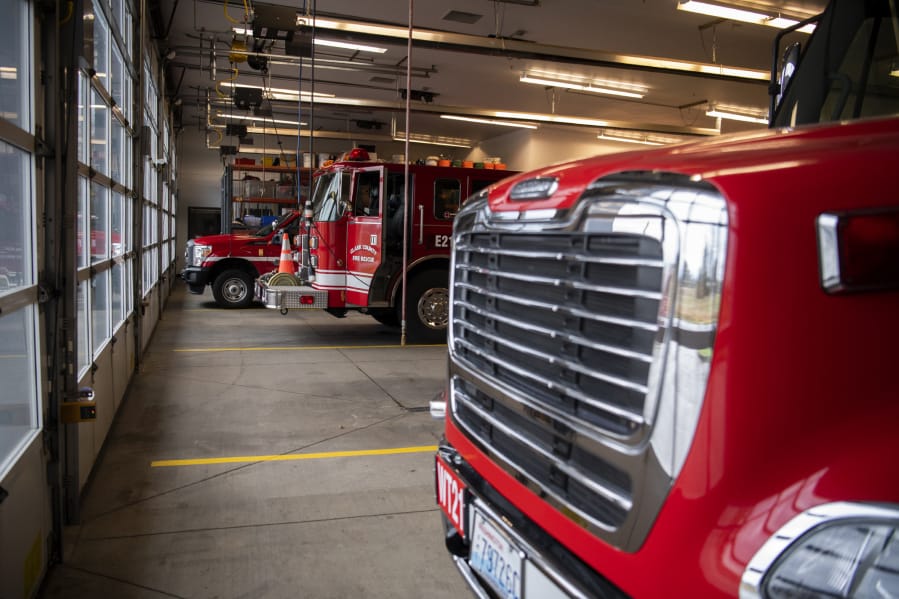 Clark County Fire &amp; Rescue vehicles are seen Monday at Fire Station 21 in Ridgefield.