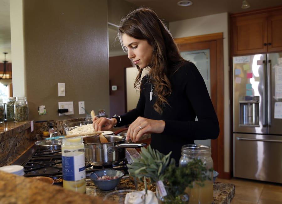 Maia Keller, co-owner of The Lighthearted Farmer, makes cauliflower mushroom soup.
