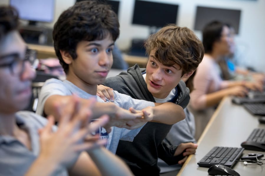 Ninth-graders Max Morrison, from left, Andres Indriago and Alex Anyse play League of Legends during the Washington-Liberty High School&#039;s team practice in October.