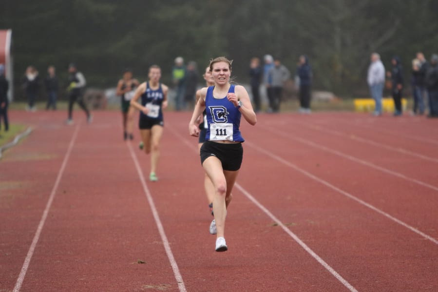 Clark College runner Paige Neff heads for the finish line to place 10th overall at the NWAC cross country champions on Monday, Nov. 20, 2019, at Saint Martin?s University in Lacey.