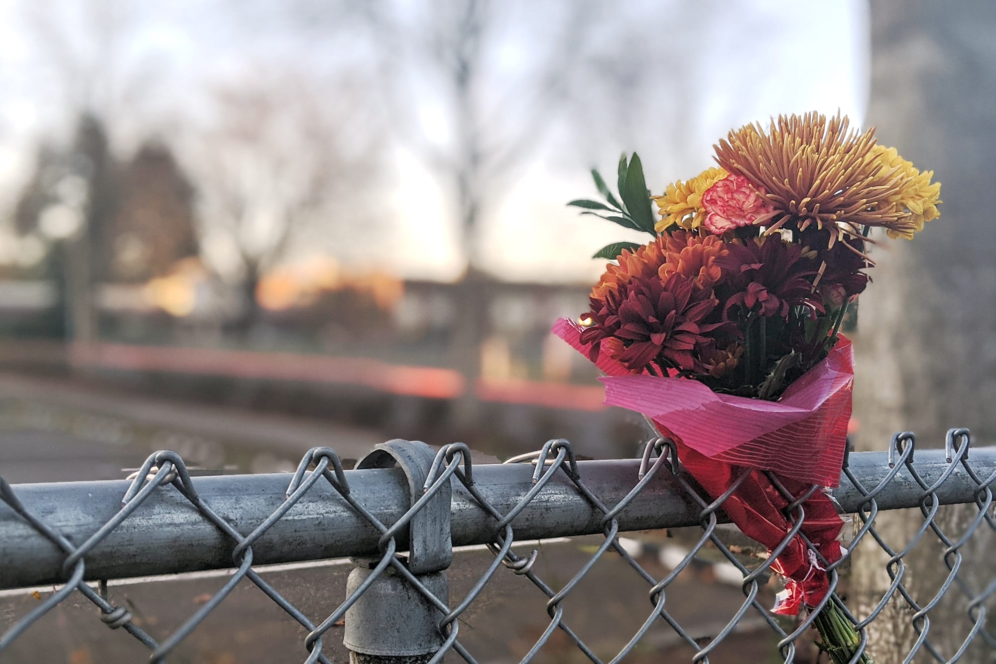A bouquet of flowers had been placed in the fence on 104th Street near the driveway of Sarah J. Anderson Elementary School on Thursday morning.