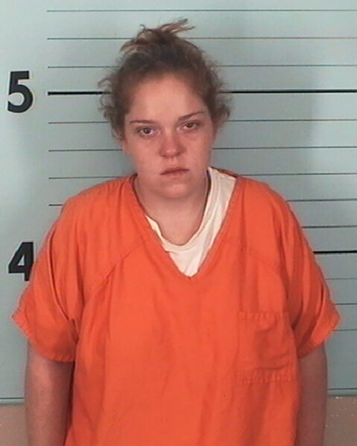 This undated booking photo provided by the Burke County, N.C., Sheriff&#039;s Office shows Callie Elizabeth Carswell, who&#039;s charged with armed robbery, misuse of 911 and filing a false police report. Police say a convenience Carswell, a convenience store clerk, staged a robbery with her boyfriend at the business Monday, Nov. 25, 2019 bought rings hours later and took video of their engagement at a Walmart.