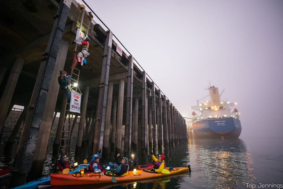 Five protesters were arrested late Tuesday morning while attempting to block a ship from unloading pieces of oil pipe at the Port of Vancouver. The protesters arrived early in the morning in boats and positioned themselves in the Columbia River at the base of one of the port docks.