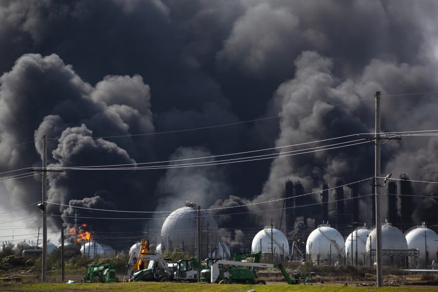 Smoke from an explosion at the TPC Group plant is seen Wednesday, Nov. 27, 2019, in Port Neches, Texas. Two massive explosions 13 hours apart tore through the chemical plant Wednesday, and one left several workers injured. (Marie D.