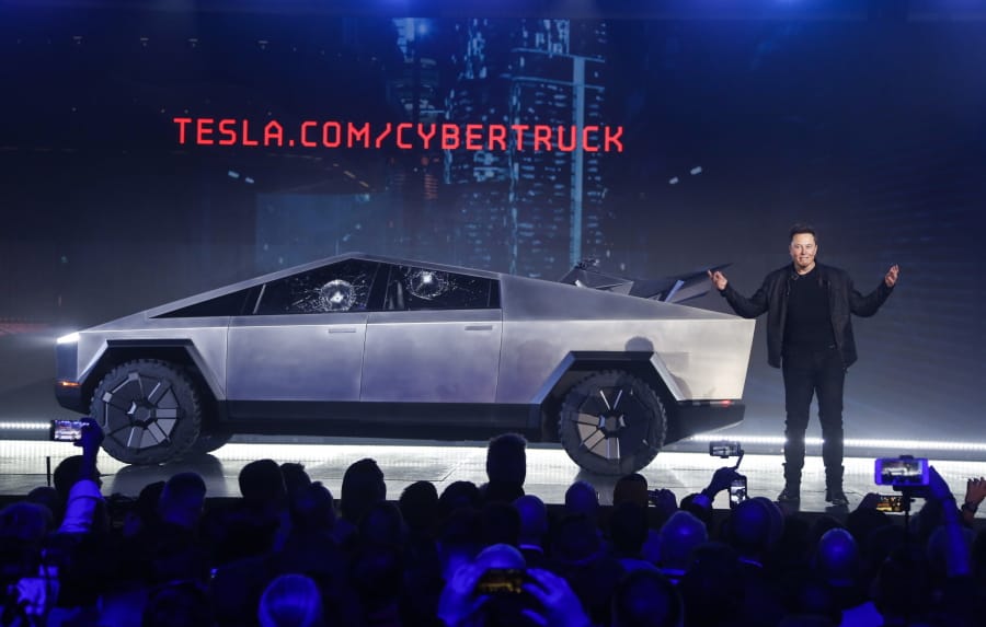 Tesla CEO Elon Musk introduces the Cybertruck at Tesla&#039;s design studio Thursday in Hawthorne, Calif. Musk is taking on the workhorse heavy pickup truck market with his latest electric vehicle. (Ringo H.W.