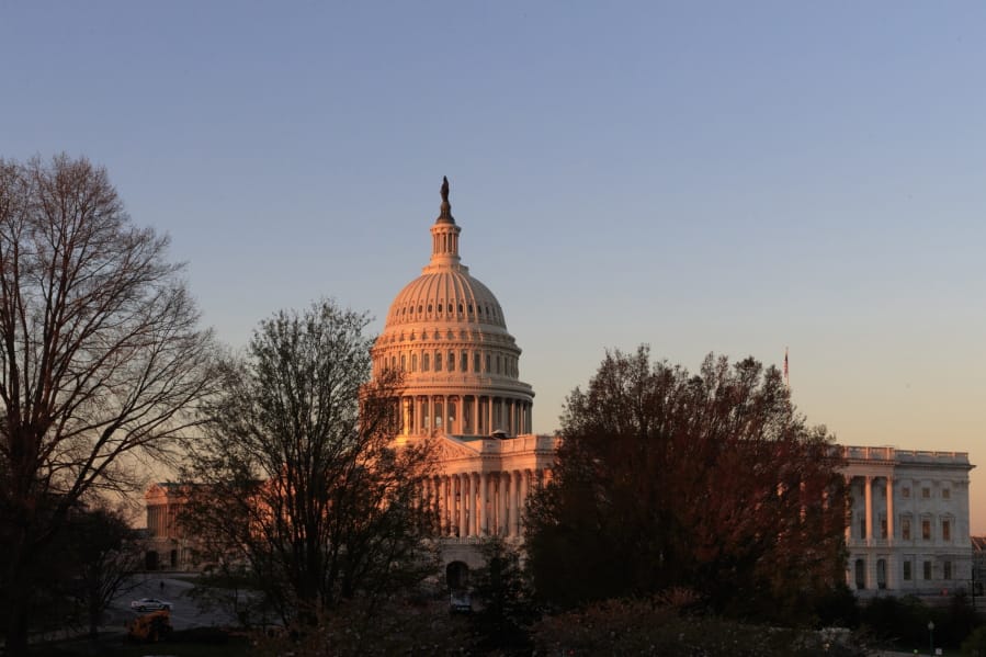 FILE - In this April 5, 2017, file photo, the Capitol is seen at sunrise in Washington.  At a time when many Americans say they&#039;re struggling to distinguish between fact and fiction, the country is broadly skeptical that facts underly some of the basic mechanisms of democracy in the United States - from political campaigns to voting choices to the policy decisions made by elected officials. (AP Photo/J.