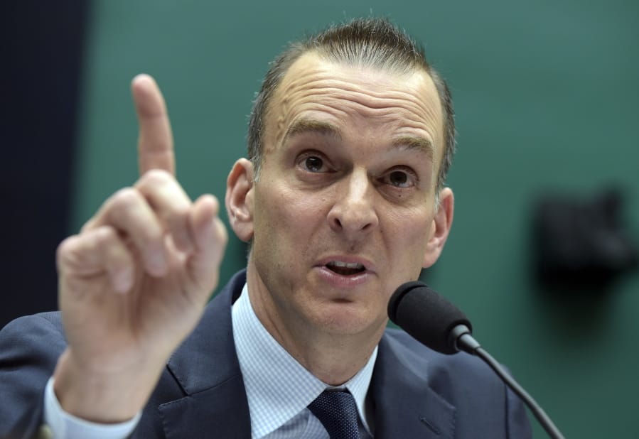 In this Feb. 28, 2017, file photo, Travis Tygart, the chief executive officer of the U.S. Anti-Doping Agency, testifies on Capitol Hill in Washington. Speeches by representatives from the U.S. and Russia delivered Wednesday, Nov. 6, 2019, in Poland, illustrated the wide gap in perceptions about the Russian doping scandal that has upended Olympic sports. Tygart said Russia can no longer be allowed to steal medals from clean athletes. A few minutes later, Russian sports minister Pavel Kolobkov said Russia has paid the price for its misdeeds and should be welcomed back into the fold. Russia is under threat of missing the Tokyo Olympics.
