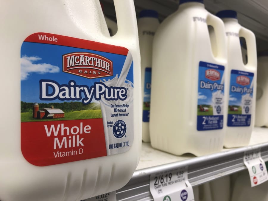 Jugs of McArthur Dairy milk, a Dean Foods brand, are shown at a grocery store, Tuesday, Nov. 12, 2019, in Surfside, Fla. Dean Foods, America&#039;s biggest milk processor, filed for bankruptcy Tuesday amid a steep, decades-long drop-off in U.S. milk consumption blamed on soda, juices and, more recently, nondairy substitutes.