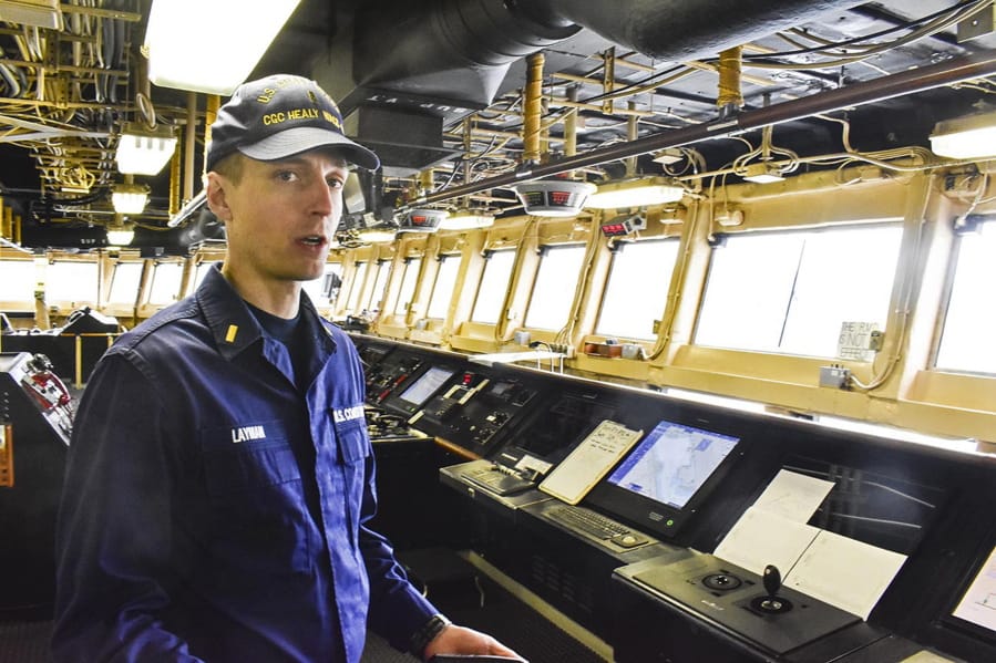 Ensign Trevor Layman, public affairs officer aboard USCGC Healy, shows off the bridge of the ship Oct. 27 as it&#039;s moored in Juneau, Alaska.