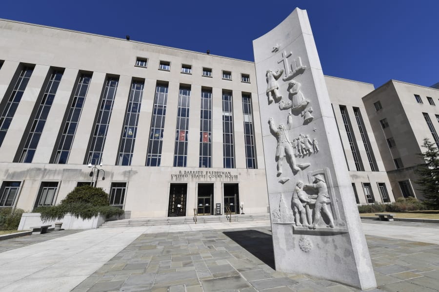 FILE - In this Oct. 11, 2019 file photo, a view of the E. Barrett Prettyman United States Courthouse in Washington.  A federal judge in the District of Columbia has temporarily halted the first federal execution in 16 years as a lawsuit on how the government intends to carry it out continues.