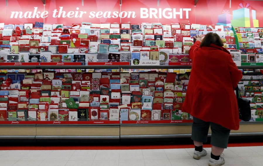 A customer shops for greeting cards at a Target store in Chicago. It&#039;s that holiday card time of year again. But before you open up the address book or spreadsheet, read up on some modern etiquette for how to address your recipients. (Nam Y.
