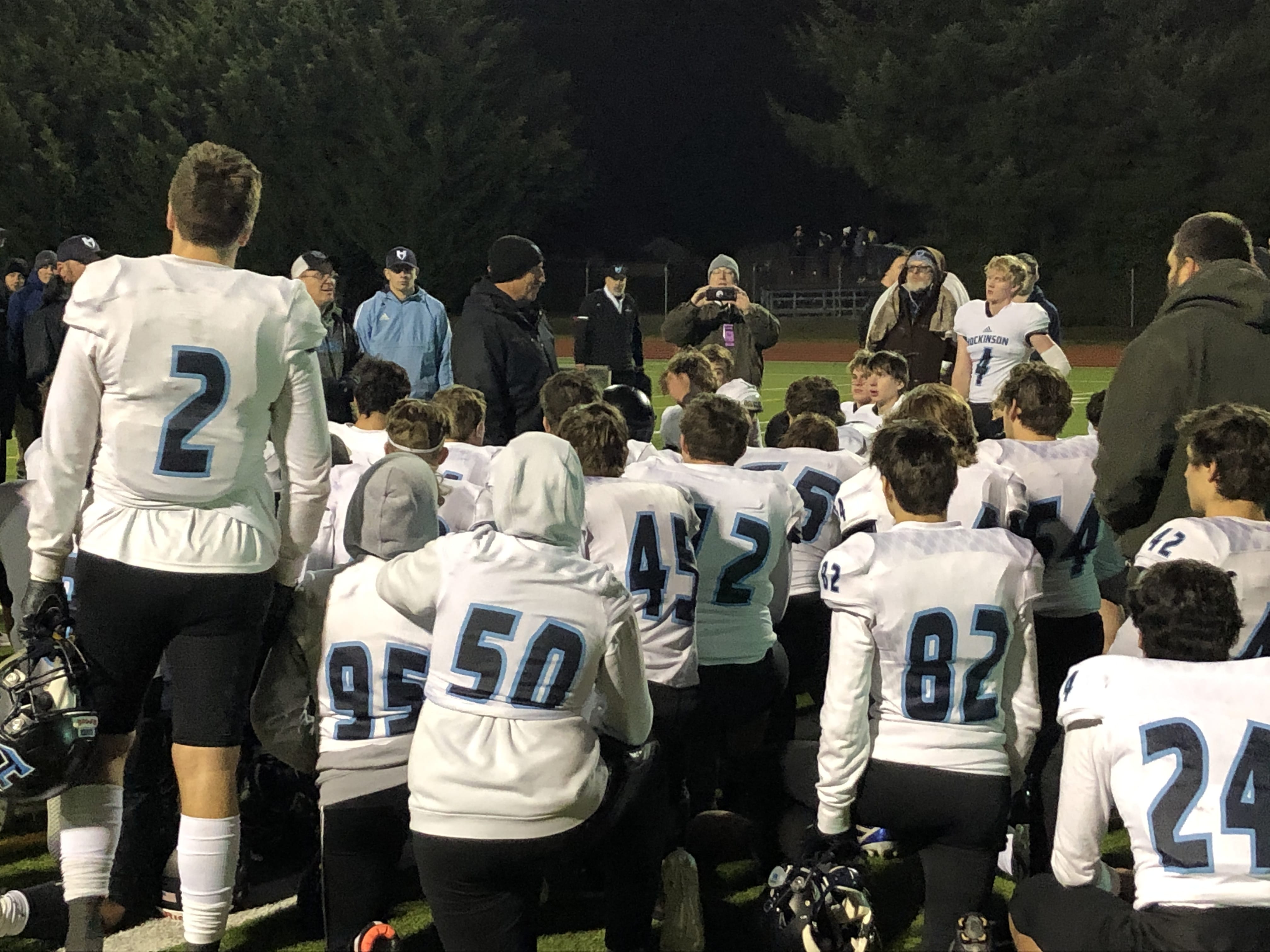 The Hockinson football team gathers after a 55-7 loss to Tumwater in the 2A state semifinals on Saturday in Tumwater (Micah Rice/The Columbian)