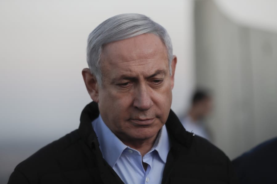 Israeli Prime Minister Benjamin Netanyahu visits an Israeli army base in the Golan Heights, on the Israeli-Syrian border, Sunday, Nov. 24, 2019.