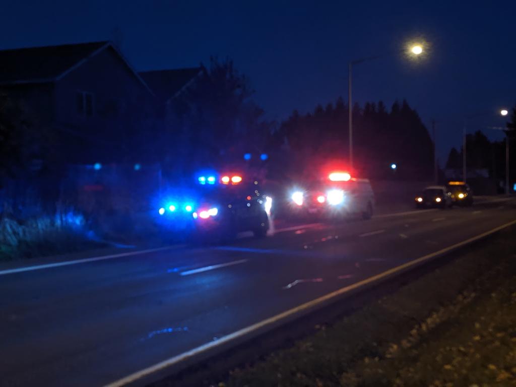 Vancouver police investigate a scene on 162nd Avenue north of 28th Street in east Vancouver early Saturday.