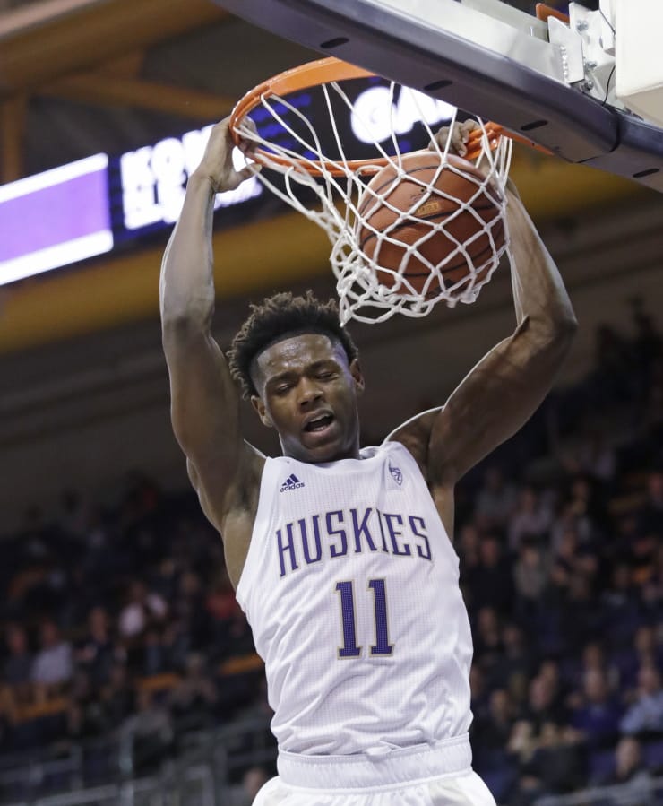 Washington&#039;s Nahziah Carter dunks against Maine during the second half of an NCAA college basketball game Tuesday, Nov. 19, 2019, in Seattle.
