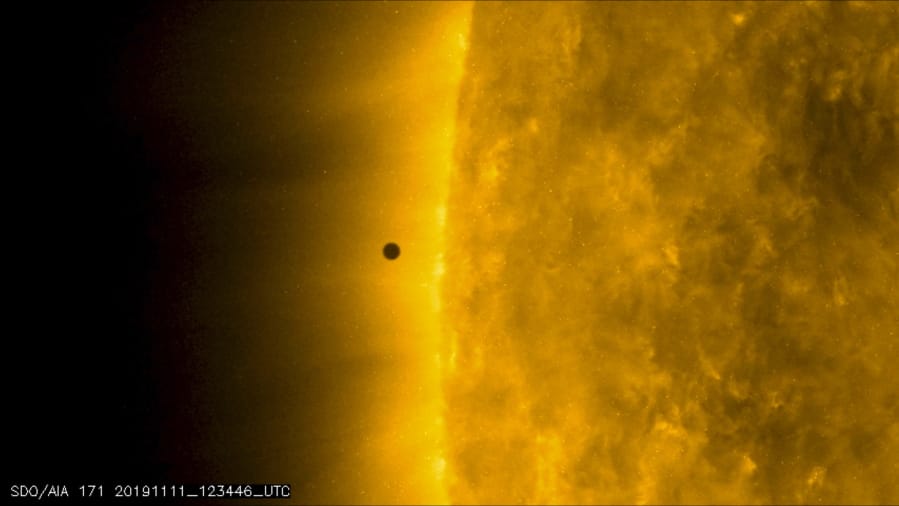 This still image from video issued by NASA&#039;s Solar Dynamics Observatory shows Mercury as it passes between Earth and the sun on Monday, Nov. 11, 2019. The solar system&#039;s smallest, innermost planet resembles a tiny black dot during the transit, which began at 7:35 a.m. EST (1205 UTC).