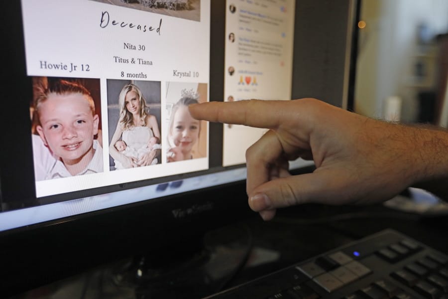 FILE - In this Tuesday, Nov. 5, 2019, file photo, Austin Cloes points to a photo of his relative Rhonita Miller and her family, who were killed in Mexico, on a computer screen, in Herriman, Utah. The recent slaying in Mexico of nine people who belonged to a Mormon offshoot community where some people practice polygamy shines a new spotlight on the ongoing struggle for the mainstream church to fight the association with plural marriage groups because of its past.