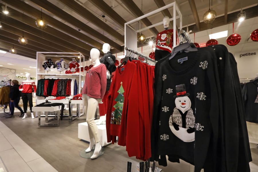 Shoppers browse holiday-themed clothing in the women&#039;s department Nov. 5 at the Macy&#039;s flagship store in New York. With the official start of the holiday shopping season just a few days away, the nation&#039;s retailers are gearing up for what will be another competitive shopping period.