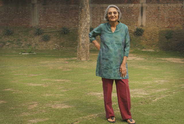 Ma Anand Sheela, spokeswoman for the controversial Osho spiritual movement in the 1980's, poses for photographers in New Delhi, India, Friday, Nov. 1, 2019. Ma Anand Sheela, who helped controversial Indian mystic Bhagwan Shree Rajneesh set up a commune in Oregon in the 1980’s and was a subject of the hit series Wild Wild Country, will star in a new documentary filmed during her first trip to India in 34 years.