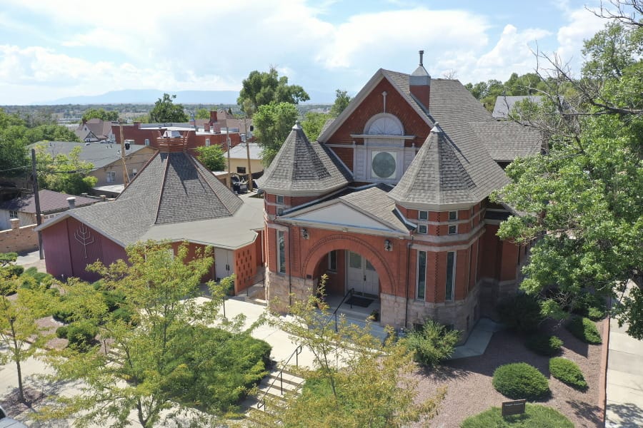This Thursday, Aug. 22, 2019, photograph, shows an aerial view of Temple Emanuel in Pueblo, Colo. Richard Holzer was charged with a federal hate crime Monday, Nov. 4, 2019, for his part in a plot to bomb the synagogue, which is the second-oldest congregation in Colorado.
