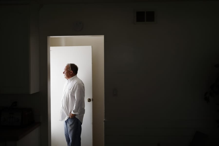 David Lasher stands for a portrait at his home in Carlsbad, Calif., on Friday, Oct. 4, 2019. When Lasher reported sexual abuse by a priest to an independent review board, the board ruled against him.