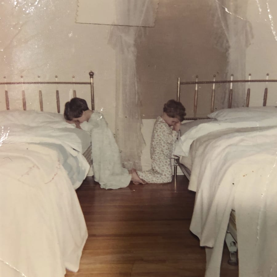 This October 1968 family photo shows Katie Bowman as a child, right, in her room in Waterloo, Iowa. Bowman&#039;s parents welcomed into their religious home three priests who molested her, she said, starting when she was around 4, a few months after this photo was made.