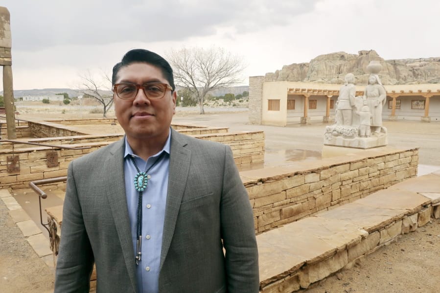 FILE - In this March 21, 2019 file photo, Acoma Pueblo Gov. Brian Vallo poses outside the Pueblo&#039;s cultural center about 60 miles west of Albuquerque, New Mexico. A ceremonial shield at the center of a yearslong international debate over exporting of sacred Native American objects to foreign markets has returned to New Mexico. U.S. and Acoma Pueblo officials planned Monday, Nov. 18 to announce the shield&#039;s return from Paris, where it had been listed for bidding in 2016 before the EVE auction house took the rare step of halting its sale. &quot;It will be a day of high emotion and thanksgiving,&quot; Vallo said ahead of the shield&#039;s expected return to his tribe.