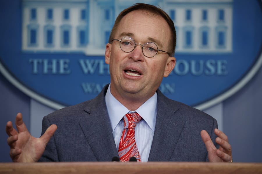 FILE - In this Oct. 17, 2019 file photo, acting White House chief of staff Mick Mulvaney speaks in the White House briefing room in Washington.