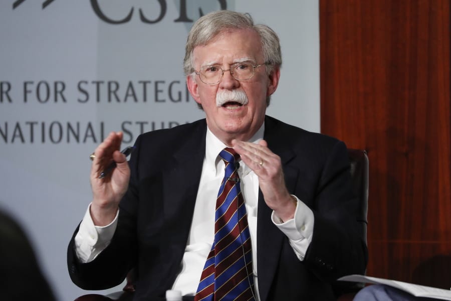 FILE - In this Sept. 30, 2019, file photo, former national security adviser John Bolton gestures while speakings at the Center for Strategic and International Studies in Washington. They are the ghosts of the House impeachment hearings. Vice President Mike Pence. Secretary of State Mike Pompeo. Energy Secretary Rick Perry. Acting White House Chief of Staff Mick Mulvaney. And perhaps most tantalizingly, the mustachioed John Bolton, President Donald Trump&#039;s former national security adviser.