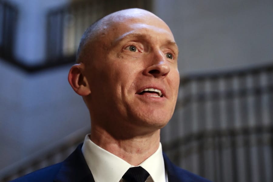 FILE - In this Nov. 2, 2017, photo, Carter Page, a foreign policy adviser to Donald Trump&#039;s 2016 presidential campaign, speaks with reporters following a day of questions from the House Intelligence Committee, on Capitol Hill in Washington. (AP Photo/J.