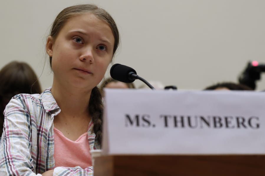 FILE - In this Wednesday, Sept. 18, 2019 file photo, youth climate change activist Greta Thunberg speaks at a House Foreign Affairs Committee subcommittee hearing on climate change on Capitol Hill in Washington. &#039;Generation Greta&#039; has become a vocal force in the debate over global warming.