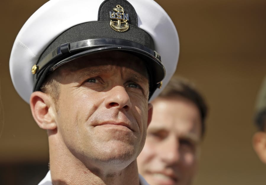 Navy Special Operations Chief Edward Gallagher leaves a military court July 2 at Naval Base San Diego. President Donald Trump intervened to restore Gallagher&#039;s rank and prevent the loss of his SEAL status after he was convicted of posing with the corpse of a dead captive in Iraq. The secretary of the Navy was fired over the case.