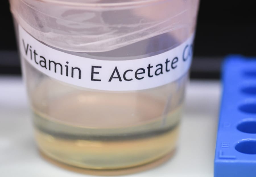 This Monday, Nov. 4, 2019 photo shows a vitamin E acetate sample during a tour of the Medical Marijuana Laboratory of Organic and Analytical Chemistry at the Wadsworth Center in Albany, N.Y. On Friday, Nov. 8, 2019, the Centers for Disease Control and Prevention in Atlanta said fluid extracted from 29 lung injury patients who vaped contained the chemical compound in all of them.