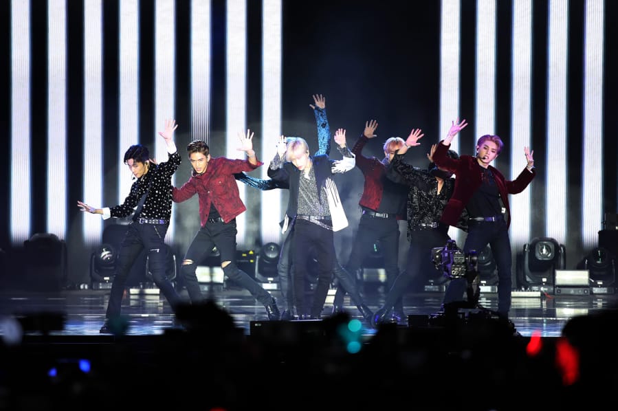 From left, Mark, Lucas, Taeyong, Baekhyun, Ten and Taeyong perform onstage during SuperM Live From Capitol Records in Hollywood at Capitol Records Tower on Oct. 5 in Los Angeles.