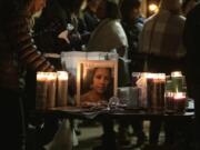 A photo of Tiffany Hill is seen on display at the candlelight vigil at Esther Short Park in Vancouver on Dec. 1.