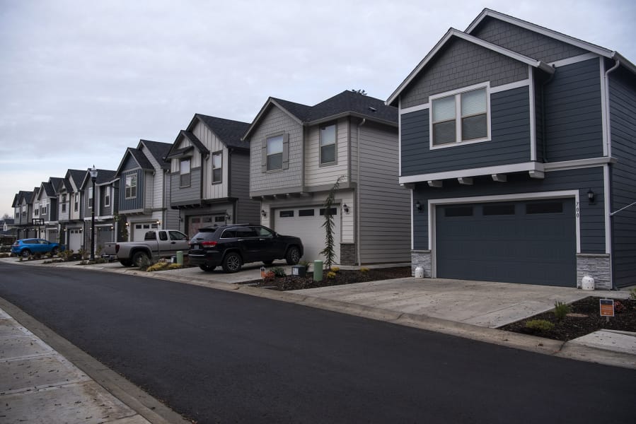 A row of recently completed homes at the Ginn Group housing development, The Landing at Salmon Creek. The community is about 75 percent complete.