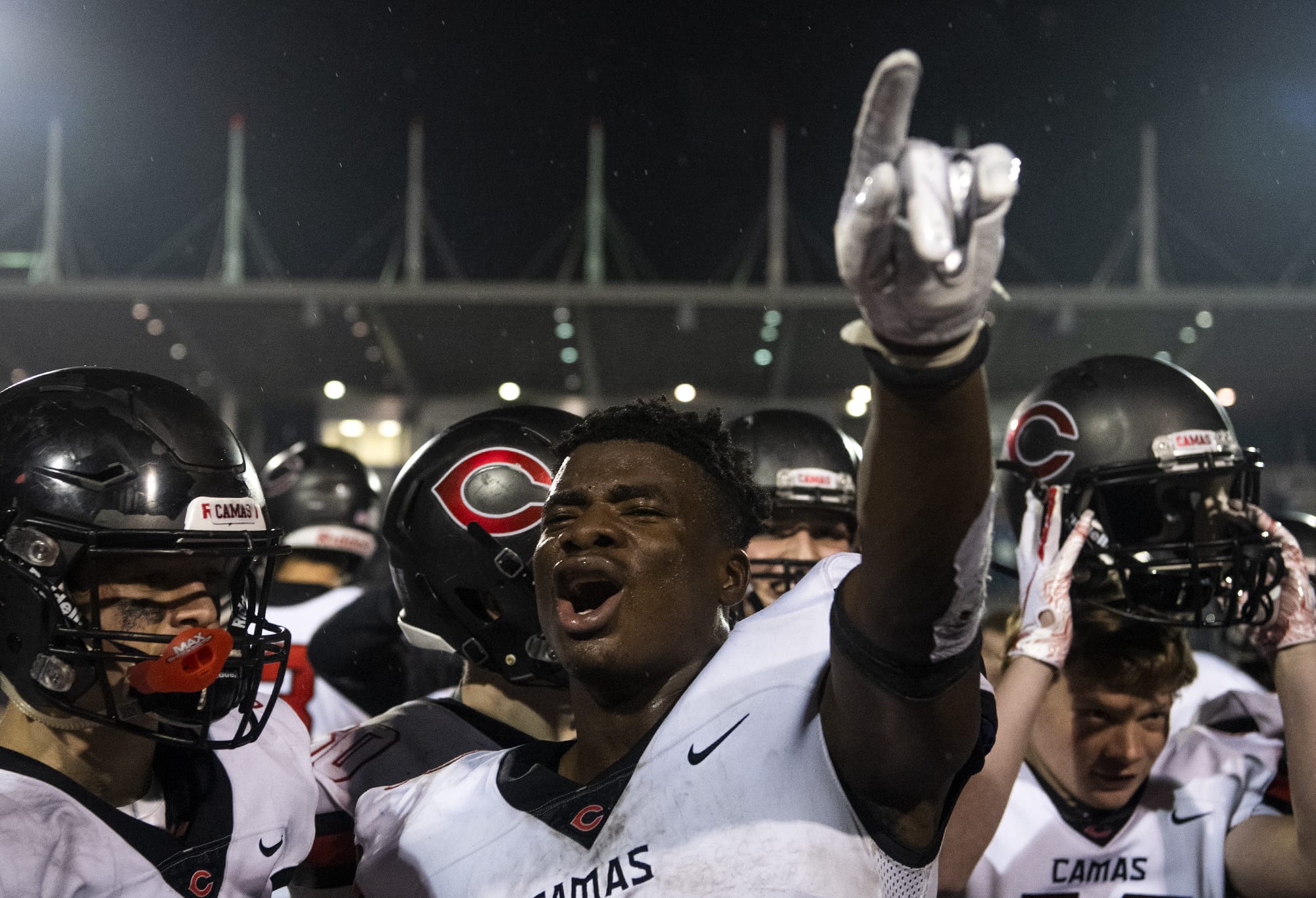 Camas' Jacques Badolato-Birdsell (2) celebrates the teamÕs win after SaturdayÕs Class 4A state championship game against Bothell at Mount Tahoma High School in Tacoma on Dec. 7, 2019.