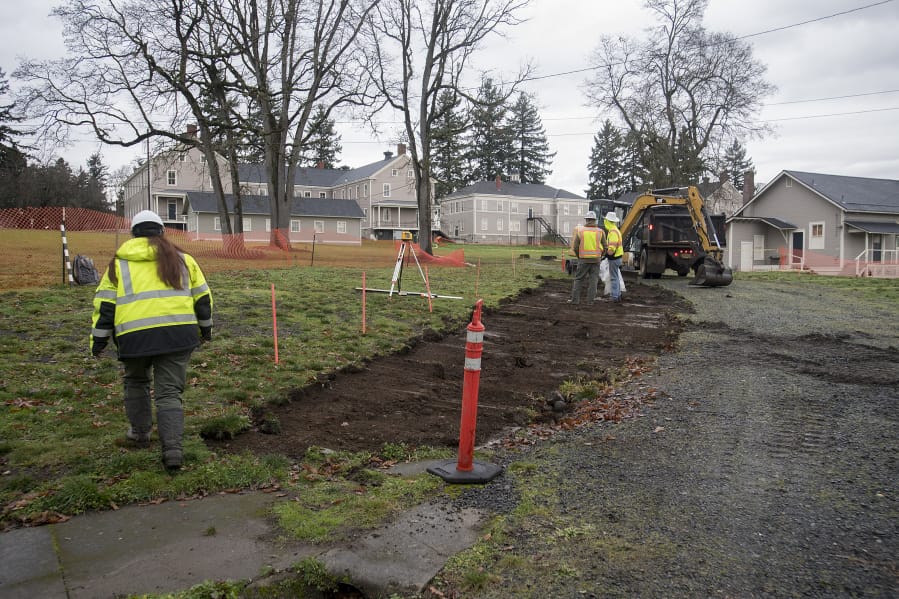 Archaeologist Elaine Dorset walks to a construction site while working at Fort Vancouver National Historic Site on Wednesday morning.