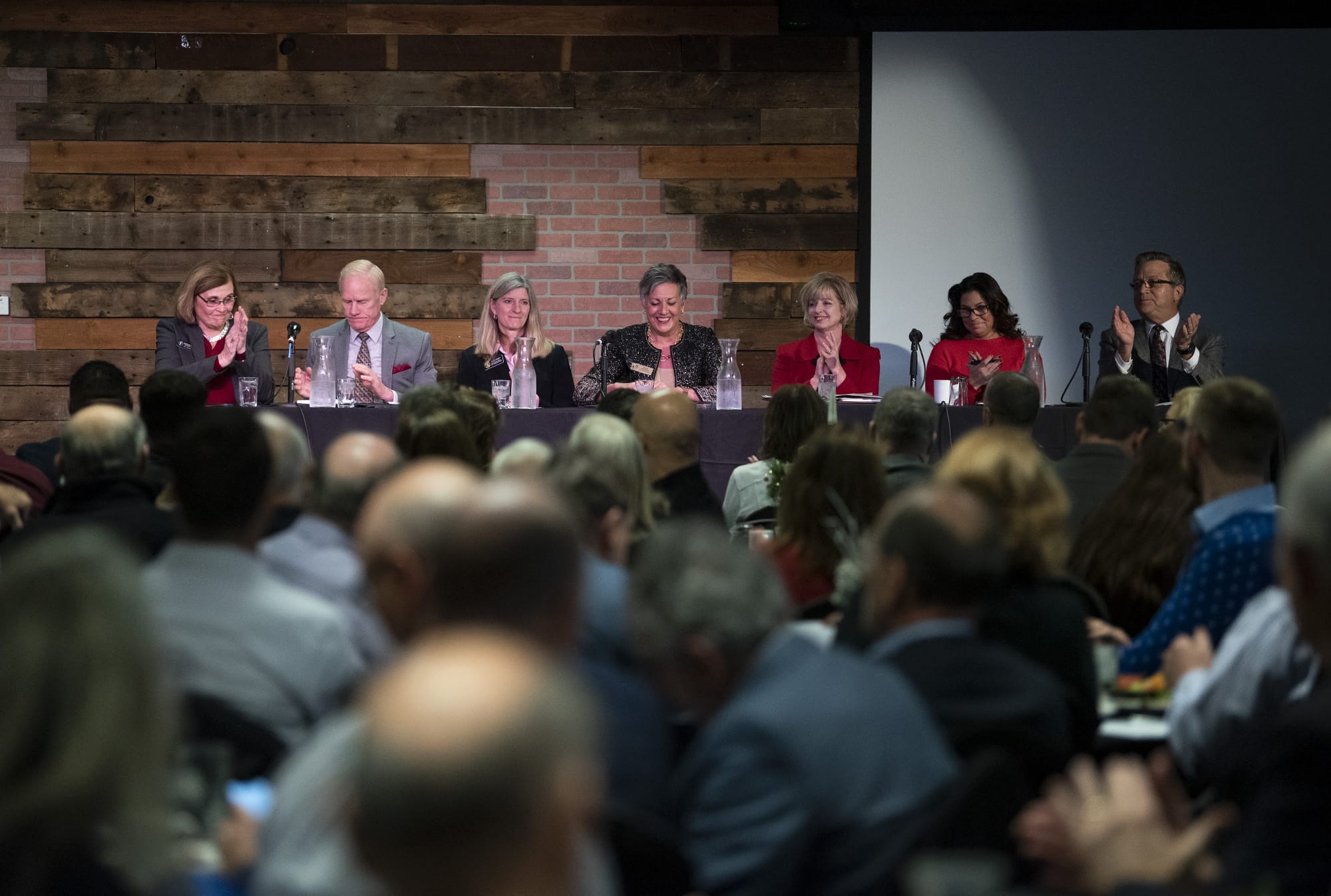 State legislators from Clark County reviewed a wide range of topics during the annual Legislative Outlook Breakfast on Friday morning at WareHouse '23 in Vancouver. State Rep. Sharon Wylie, D-Vancouver, from left, state Rep. Paul Harris, R-Vancouver, state Rep. Vicki Kraft, R-Vancouver, state Sen. Lynda Wilson, R-Vancouver, state Sen. Annette Cleveland, D-Vancouver, state Rep. Monica Stonier, D-Vancouver, and state Rep. Larry Hoff, R-Vancouver, spoke during the breakfast.