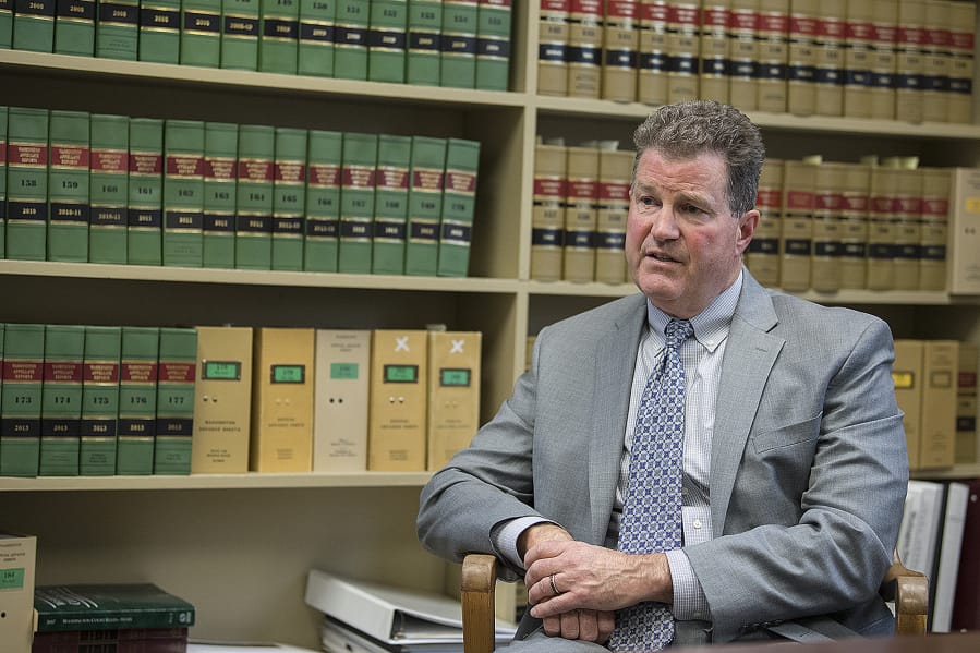 Clark County Superior Court Judge John Fairgrieve talks in his office Friday afternoon about what factors generally go into determining bail and why domestic violence cases are particularly tough to decide.