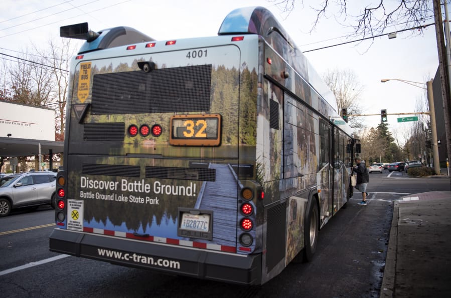 The Battle Ground-themed bus at a stop in downtown Vancouver.