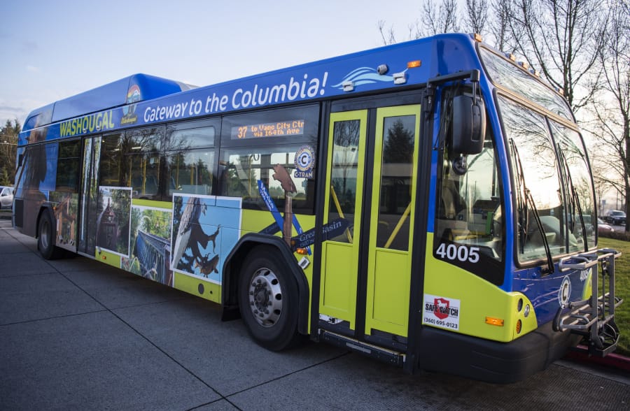 One of the new city-themed buses featuring photos of Washougal is pictured on a C-Tran bus as it stops at the Fisher&#039;s Landing Transit Center in Vancouver on Dec. 13, 2019.