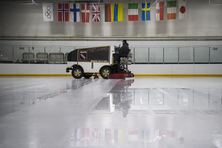 Brennan Bloemke drives an Olympia ice resurfacer at Mountain View Ice Arena on a recent weekday following an adult hockey game and before an open skate started. He completes &quot;depending on the night, four to six cuts. Then depending on how rough the day was, it adds on at the end of the night because you have to get the ice ready at the end of the day.
