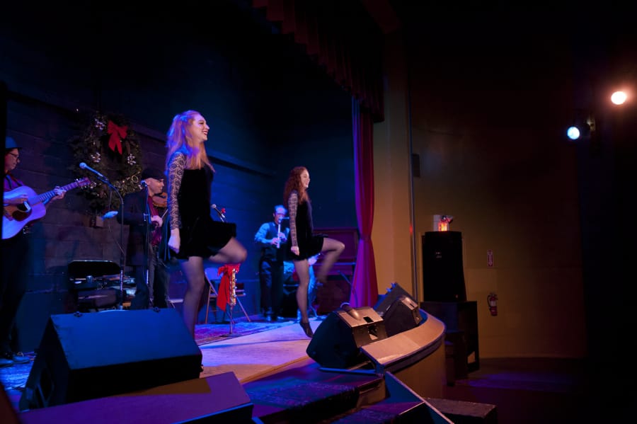 Joined by Portland-based Irish dancers Brittany Ramsey, left, and Marisa Gilman, Molly&#039;s Revenge played a number of original and traditional Celtic songs Sunday at the Old Liberty Theater in Ridgefield.