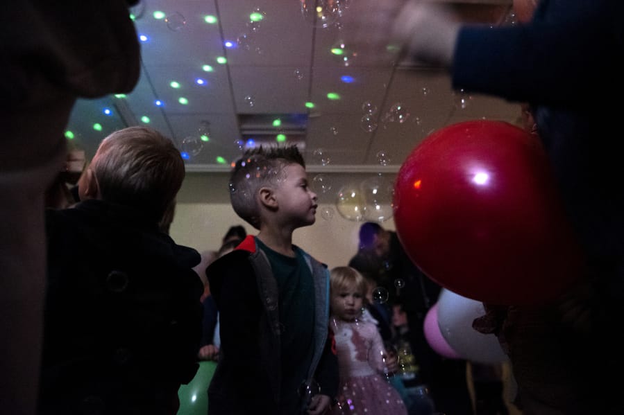 Jasper Fulleylove, 4, of Camas dances during the Noon Year&#039;s Eve Party at Camas Public Library on Tuesday.