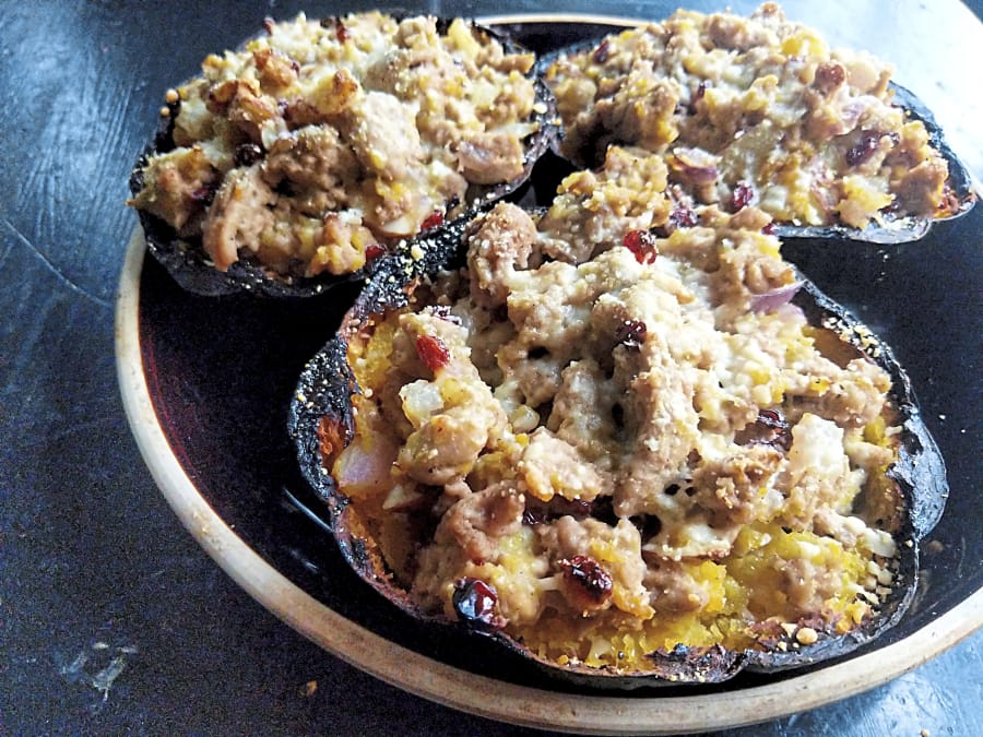 Roasted acorn squash is filled with seasoned ground turkey and Parmesan, and baked until soft.