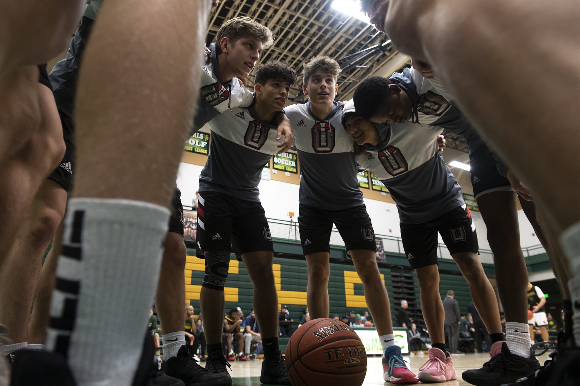 Union huddles prior to their game against Evergreen at Evergreen High School on Wednesday night, Dec. 17, 2019.