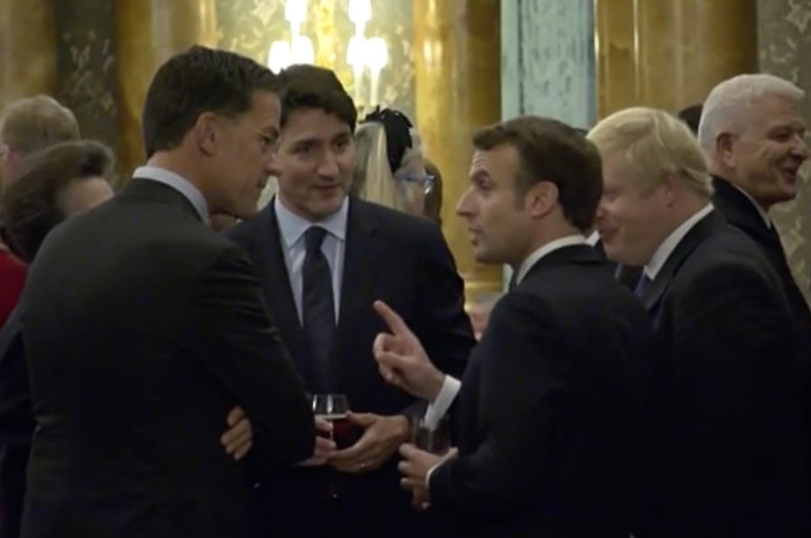 In this grab taken from video on Tuesday, Dec. 3, 2019, France&#039;s President Emmanuel Macro, centre right, gestures as he speaks during a NATO reception. While NATO leaders are professing unity as they gather for a summit near London, several seem to have been caught in an unguarded exchange on camera apparently gossiping about U.S. President Donald Trump&#039;s behavior. In footage recorded during a reception at Buckingham Palace on Tuesday, Canadian Prime Minister Justin Trudeau was seen standing in a huddle with French President Emmanuel Macron, British Prime Minister Boris Johnson, Dutch Prime Minister Mark Rutte and Britain&#039;s Princess Anne.