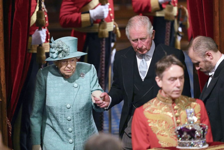 Britain&#039;s Queen Elizabeth II and Prince Charles walk behind the Imperial State Crown as they arrive in the chamber for the State Opening of Parliament, in the House of Lords at the Palace of Westminster in London, Thursday Dec. 19, 2019. Queen Elizabeth II will formally open a new session of Britain&#039;s Parliament on Thursday, with a speech giving the first concrete details of what Prime Minister Boris Johnson plans to do with his commanding House of Commons majority.