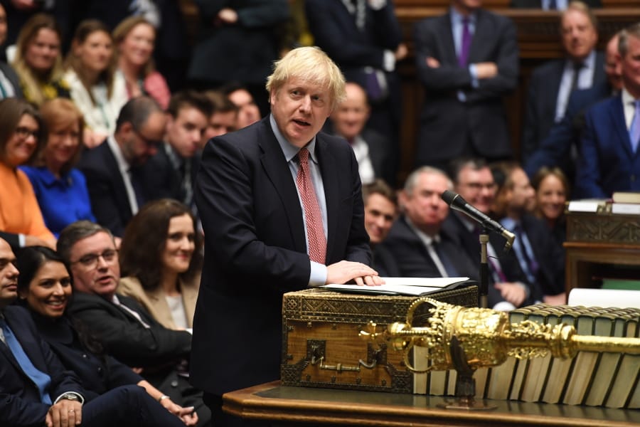 In this photo released by the House of Commons, Britain&#039;s Prime Minister Boris Johnson speaks to the house on the first day of the new Parliament, in London, Tuesday, Dec. 17, 2019. Buoyed by a big new Conservative majority in Parliament, Johnson toughened his Brexit stance on Tuesday, ruling out any extension of an end-of-2020 deadline to strike a trade deal with the European Union.
